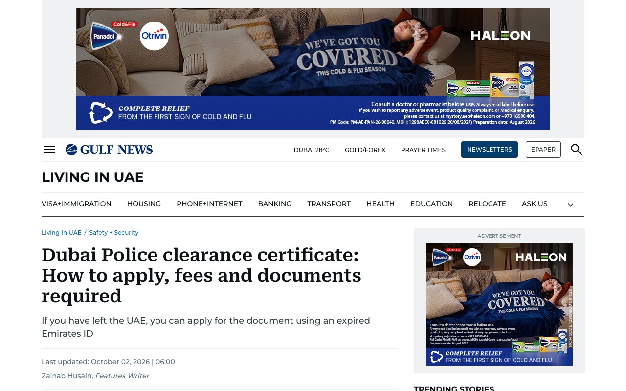 Screenshot of the Gulf News article headed Dubai Police clearance certificate: How to apply, fees and documents required, last updated October 02 2026, by features writer Zainab Husain, noting that an applicant who has left the UAE can apply using an expired Emirates ID.
